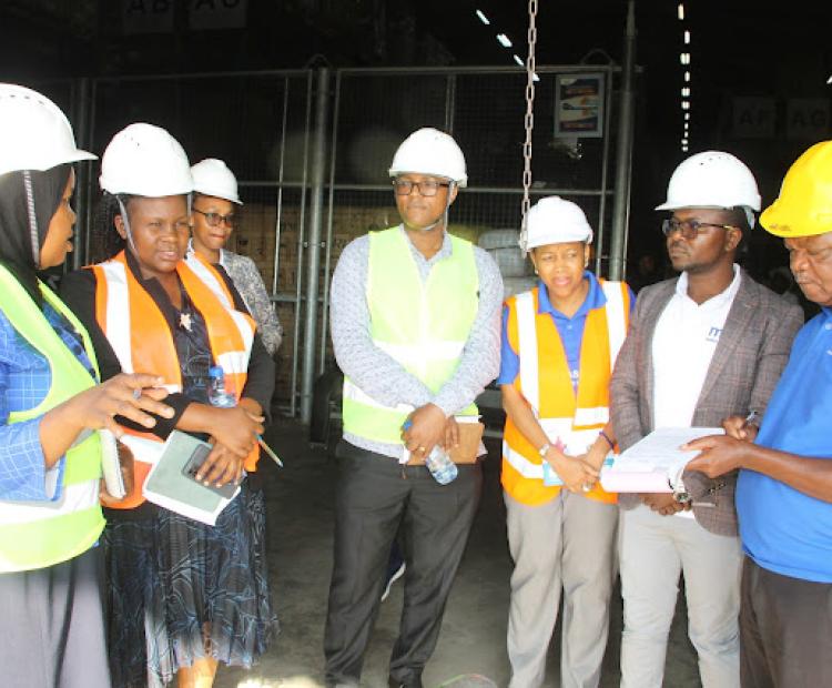 Member of the Board of Trustees of the Medical Depot (MSD) Dr. Rukia Mwifunyi Receiving Information From the Tanga Zone Manager of MSD