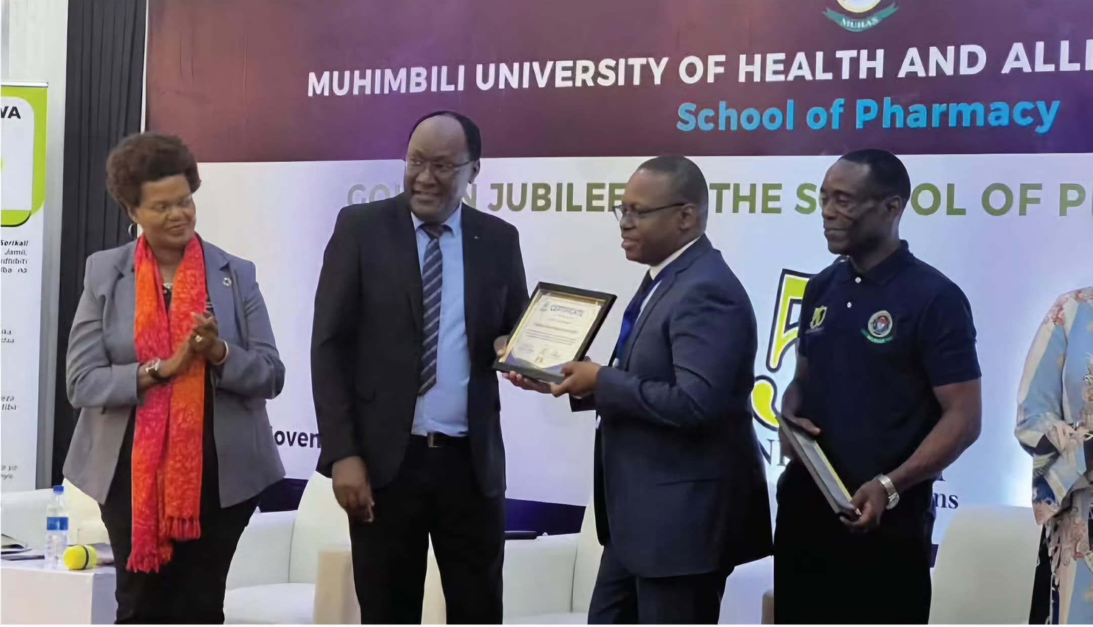 MSD Director General Mavere Tukai Receiving a Special Award from the Leadership of the School of Pharmacy (MUHAS)