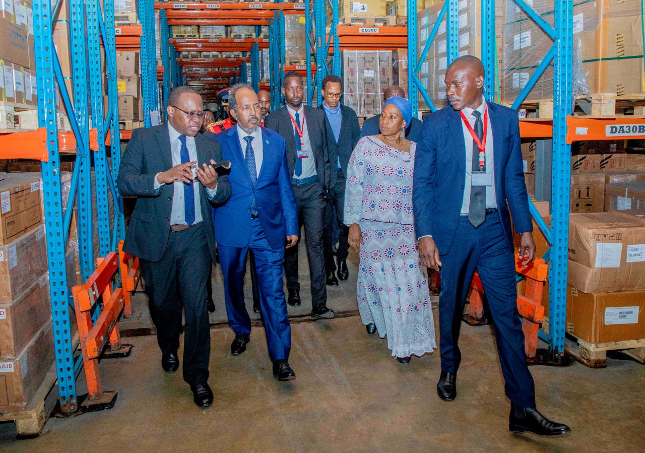 Somali President Hon. Hassan Sheikh Mohamud, with the Minister of Health Hon. Ummy Mwalimu and the Director General of MSD During the President's Visit to the MSD Keko Drug Depot Headquarters