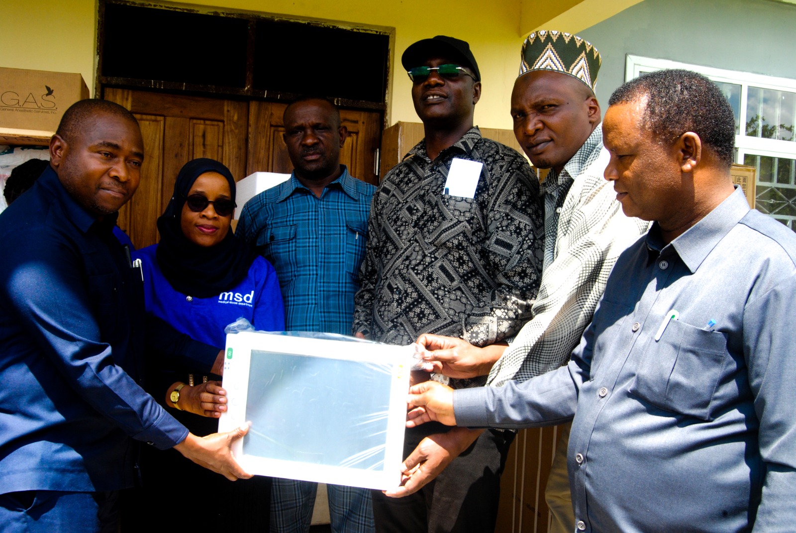 Manyoni District Commissioner Hon. Vicent Mashinji Receiving Surgical Equipment Presented by the MSD Dodoma Zone Manager