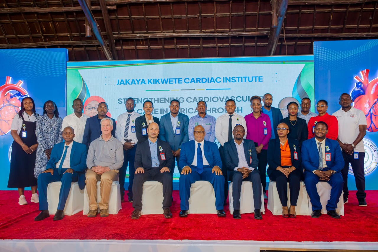 MSD Customer Service Officer Dar es Salaam Region Ms. Diana Kimario Receiving an Award from the Official Guest and Minister of Health of the Revolutionary Government of Zanzibar on behalf of MSD Leadership, During the International Heart Disease Conference