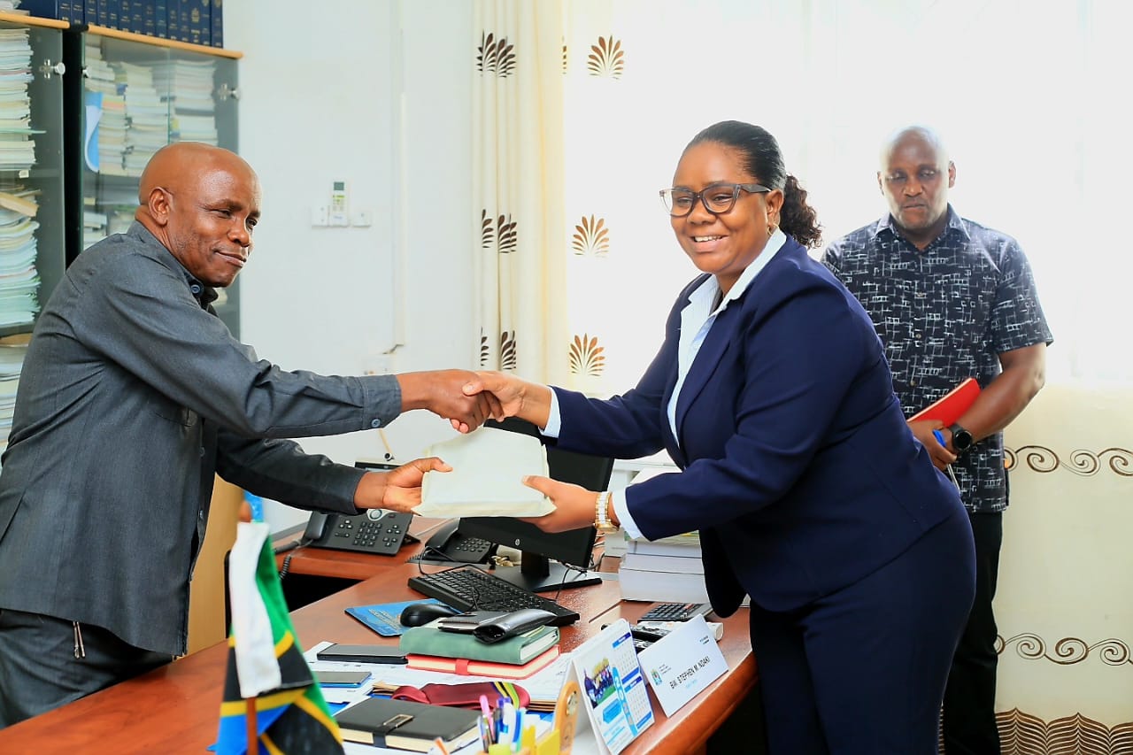 MSD Board of Trustees Chairperson Ms. Rosemary Silaa Presenting a Special Gift to the Kagera Regional Administrative Secretary Mr. Stephen Ndaki, When She Visited Him at His Office.