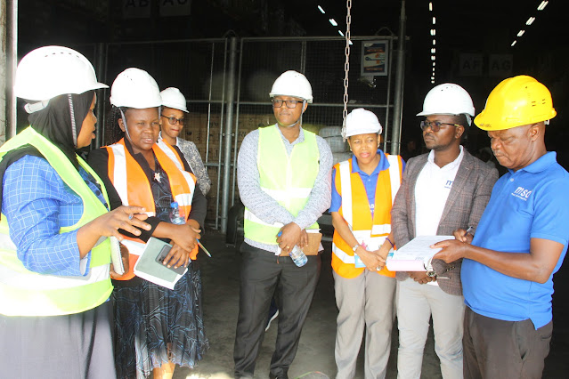 Member of the Board of Trustees of the Medical Depot (MSD) Dr. Rukia Mwifunyi Receiving Information From the Tanga Zone Manager of MSD