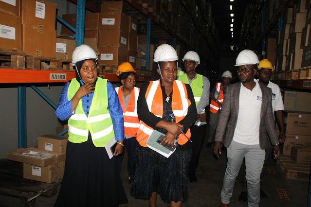 Member of the Board of Trustees of the Medical Depot (MSD) Dr. Rukia Mwifunyi in a Group Photo with MSD Tanga Regional Staff.