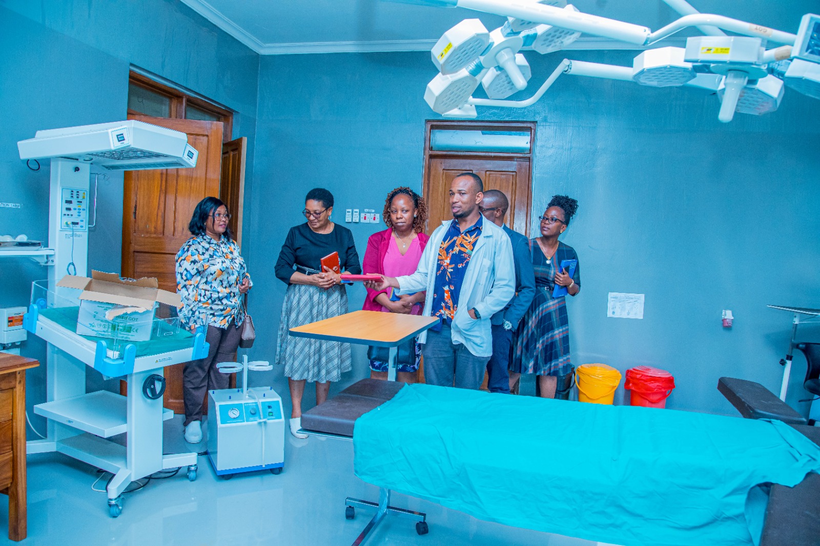 MSD Board of Trustees Member Dr. Ritah Mutagonda, Receiving Information From the Medical Officer of Uru Kyaseni Health Center Dr. Emmanuel Makundi