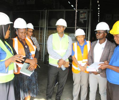 Member of the Board of Trustees of the Medical Depot (MSD) Dr. Rukia Mwifunyi Receiving Information From the Tanga Zone Manager of MSD
