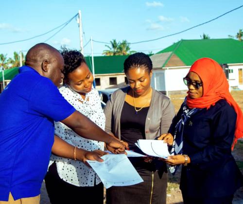 Officials from MSD, (first left, and second right), handing over Medical Equipment Documents to the Chief Medical Officer of Dar es Salaam City